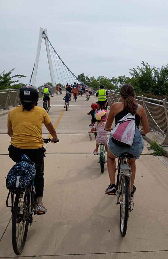 Untitled A group of children and adults going over the 35th St pedestrian bridge.